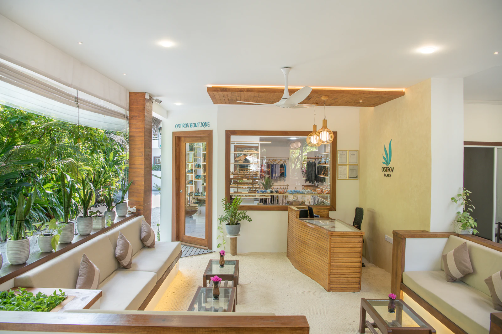 The reception lounge and adjacent boutique area at Ostrov