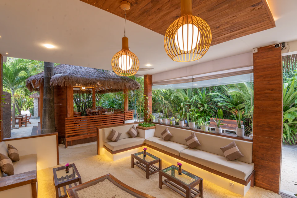 Alternate wide view of the open-air lobby lounge and reception