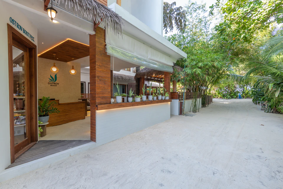 Exterior view of the reception opening beside a sandy garden path