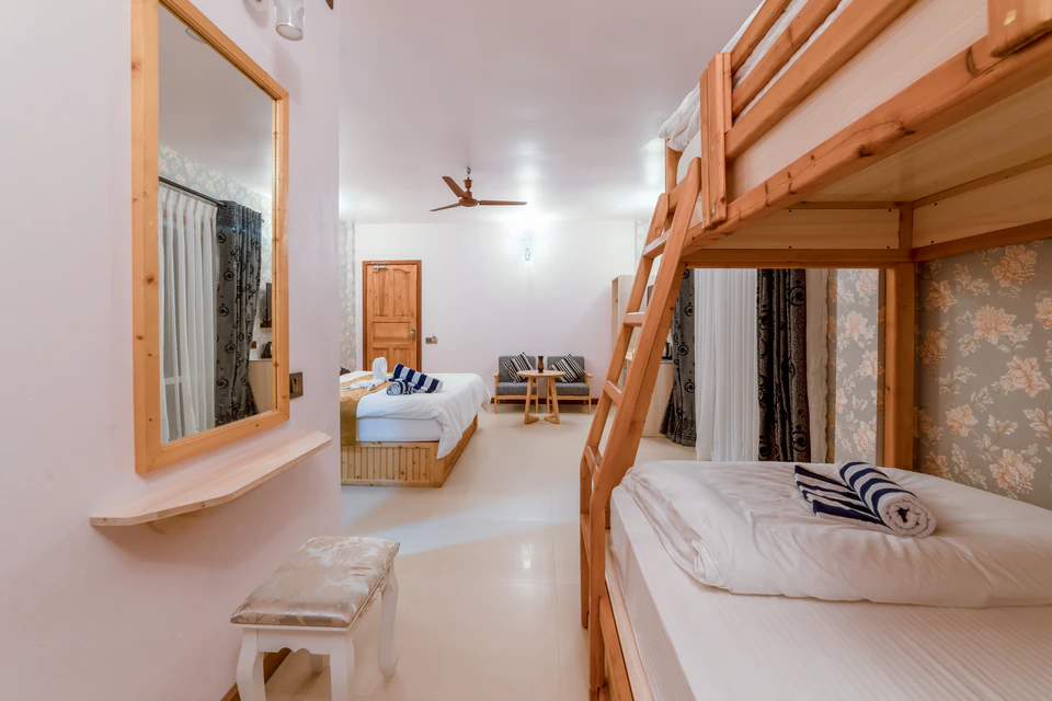 Alternate view past the bunk beds toward the double bed